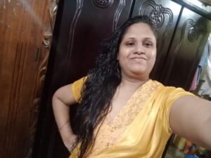 MILF standing topless in bathroom selfie