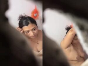 neighbor wife bath and wearing bra caught through