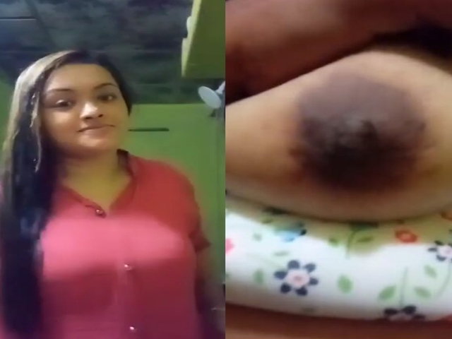 cute girl opens bra to show sexy boobs to