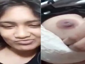 cute expression during topless boobs show by Indian