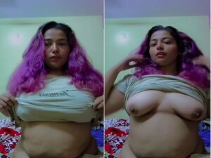 purple head desi girl holding huge milk