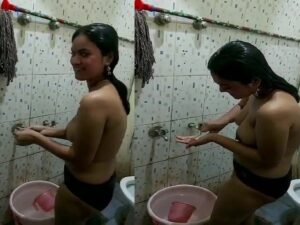 girlfriend bathing under shower in topless caught by