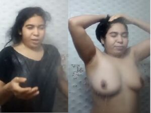mature and sexy MILF bathing under shower with boobs