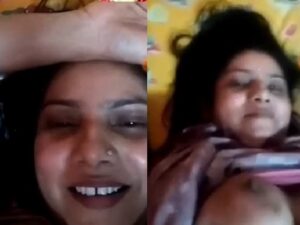 bubbly Indian girl playing with her big boobs and