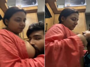 wife feeding boobs to husband in open night